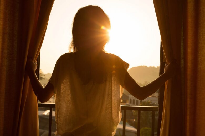 woman curtains